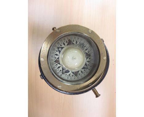 An oak cased circular aneroid Barometer with rope twist surround, a Ship's Compass by Lilley & Reynolds, London, and a pair o