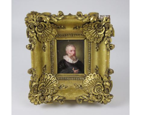An 18th Century miniature half Portrait on enamel of bearded gentleman with ruffle in ornate gilt frame A/F, labelled verso 1