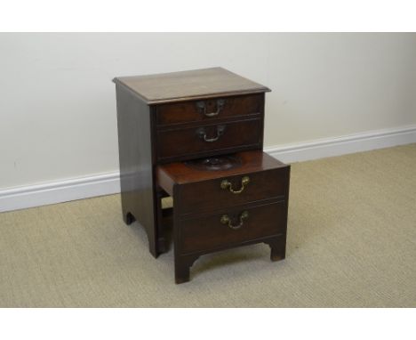 A George II mahogany Commode with fall front above pull-out base, simulated as four drawers on bracket feet, 22in
