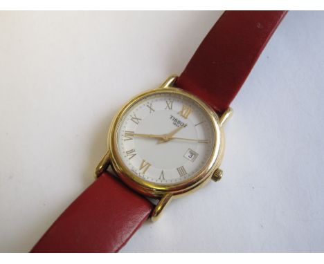 A Lady's Tissot Le Locle Wristwatch, the white dial with roman numerals, sweep seconds hand and date aperture at 3 o'clock in