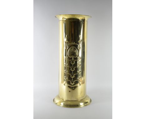 An Art Nouveau brass Stick Stand of cylindrical form with embossed stylised floral designs, 2ft 3in H