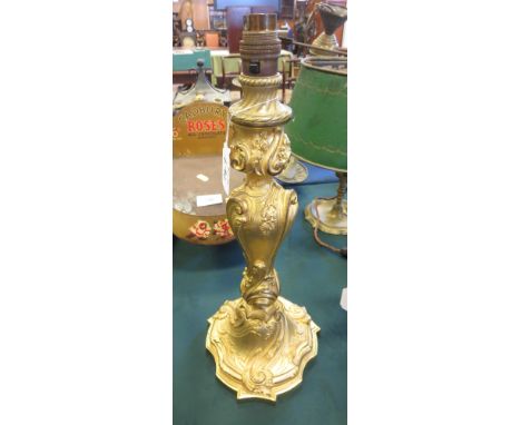 A 19th Century ormolu Lamp/Candlestand with scrolled decoration on shaped base, converted to electricity, 15in