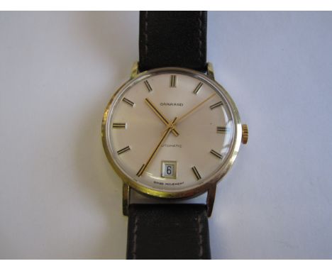 A Gentleman's Garrard Automatic Wristwatch the silvered dial with hourly baton markers, sweep seconds hand and date aperture 