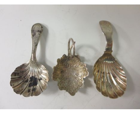 A Georgian silver vine leaf Caddy Spoon, with coiled twig handle, Birmingham circa 1830, maker: Taylor & Perry, and two other