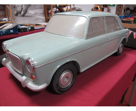 An Unusual Large Scale Contemporary Fibre Glass Model, of a Morris/Austin 1100 in light blue, some damage especially to chrom