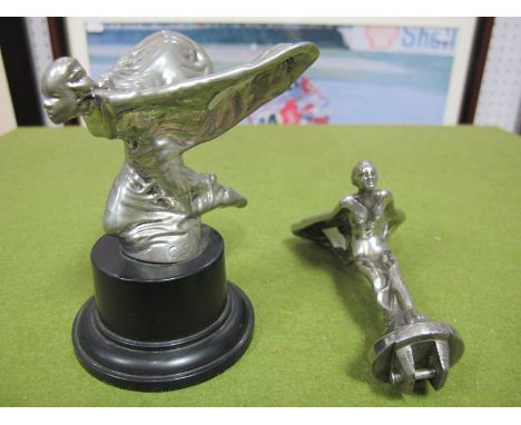 A Rolls Royce Spirit of Ecstasy Flying Lady Car Mascot, inscribed at base C. Sykes 25.1.34 mounted on a plinth. A Rolls Royce