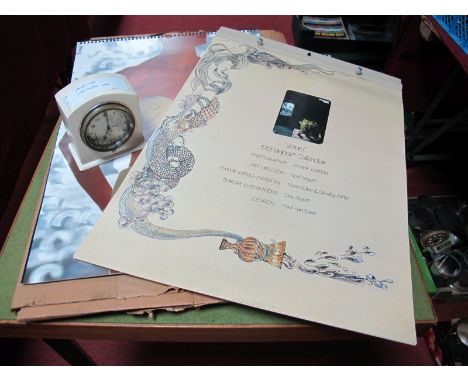 A Calthorpe Car Clock, framed into a mantle clock, plus Pirelli Calendar. (2)
