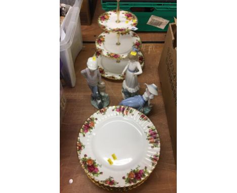 Quantity Royal Albert Old Country Rose dinner plates, cake stand, one Lladro and two Nao figures