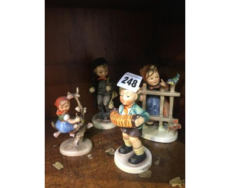 Four Hummel figures
