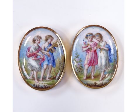 A pair of early 19th century painted enamel miniature panels, depicting girls with flowers, in unmarked gold frames, height 2