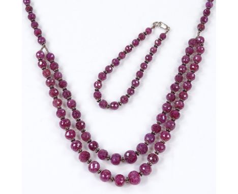 A sterling silver and faceted ruby necklace and bracelet set, necklace length 48cm (2) 