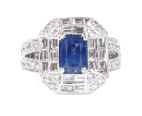 A 14ct white gold sapphire and diamond cluster dress ring, with baguette and round-cut diamonds, and openwork under bridge, s