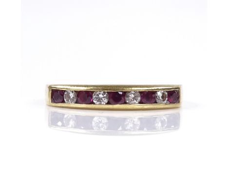 An 18ct gold ruby and diamond half-hoop ring, setting height 3.4mm, size O, 3.1g 