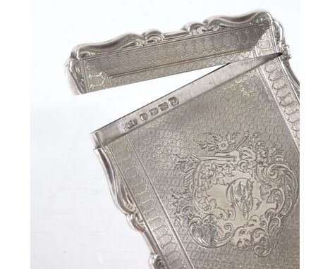 A Victorian rectangular silver card case, with engine turned decoration, by Colen Hewer Cheshire, hallmarks Birmingham 1878, 
