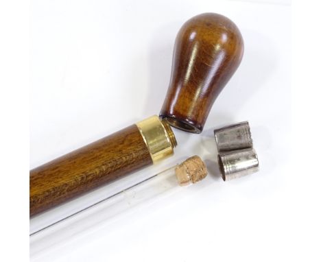 A stained wood spirit cane with screw-on handle and glass tube lining 