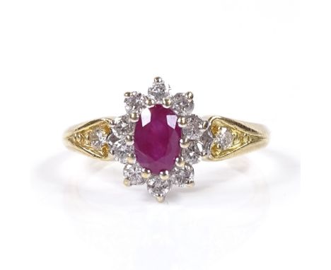 An 18ct gold ruby and diamond cluster ring, with diamond and engraved shoulders, setting height 11.3mm, size N, 3.1g 