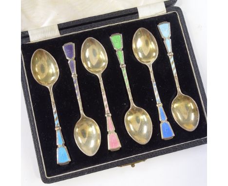 A cased set of silver-gilt and coloured enamel coffee spoons, by Walker &amp; Hall, hallmarks Birmingham 1958 