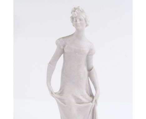 A sevres unglazed bisque porcelain figure of a lady, height 14cm, in original fitted leather box 
