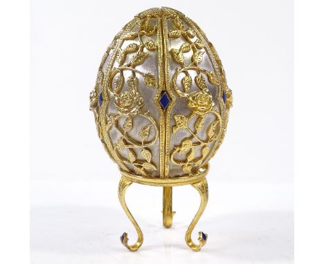 A Theo Faberge style St Petersburg Collection Egg Emergence of Spring, silver and enamel egg, opening to reveal butterfly, wi