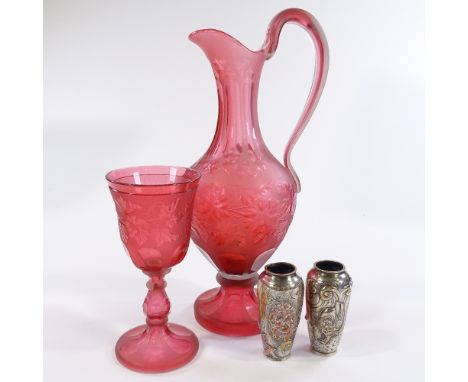 A ruby glass ewer with engraved grapevine decoration, height 37cm, matching goblet (stem A/F), and a pair of Japanese 3-colou