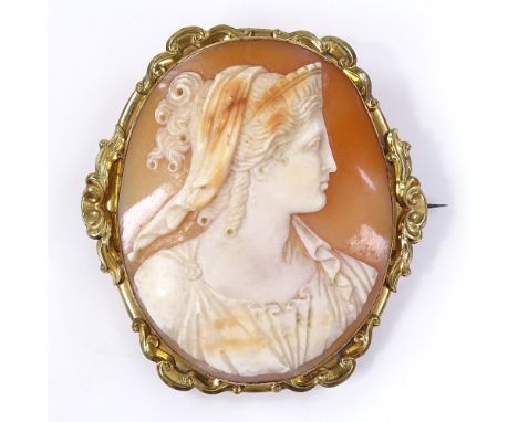 An oval relief carved cameo panel brooch, depicting female portrait, in gilt-metal frame, panel height 46.6mm, 17.4g 