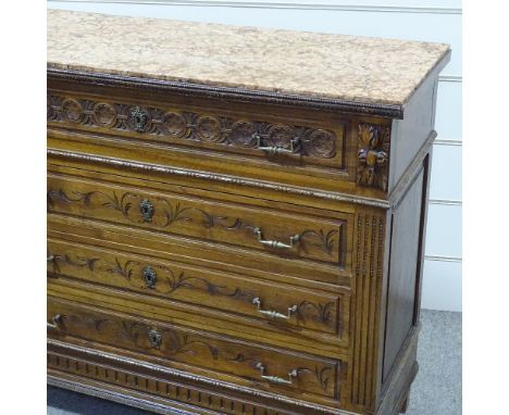 A 19th century French walnut 4-drawer commode, with carved drawer fronts and coloured marble top, width 3'10", height 3'4" 