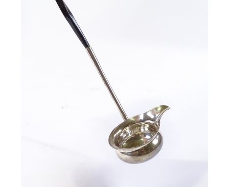 A George V silver spouted toddy ladle, with twisted whale bone handle, by Barker Brothers Ltd, hallmarks Chester 1912, length