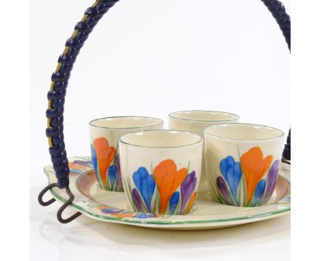 A Clarice Cliff Bizarre Crocus pattern egg set on stand 
