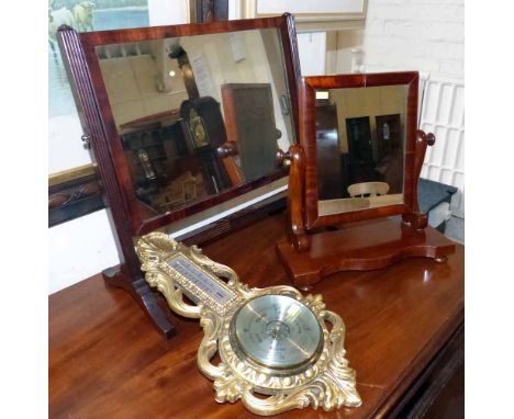 Two mahogany swing frame toilet mirrors and reproduction gilt barometer, Comitt of London (Reflectwell). Condition report: se