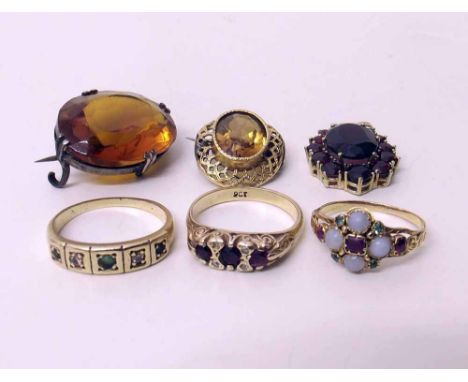 Opal, ruby and ermerald dress ring, two other rings, '333' gold and garnet brooch, citrine mourning brooch, amber glass brooc