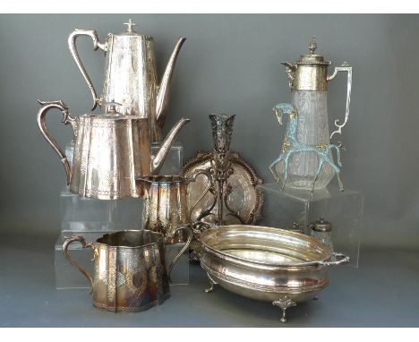 A large quantity of plated ware including an ornate pierced epergne, Victorian Walker and Hall tea set, Mappin and Webb glass