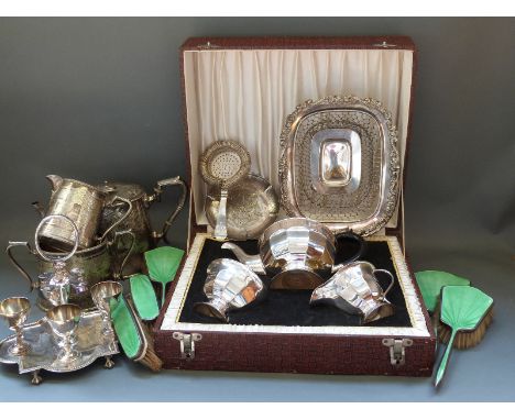 A cased silver plated tea set, further plated ware including pierced basket, tea ware, guilloché enamel dressing table set an