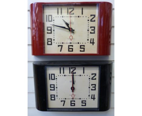 Two Newgate quartz 'Metro' clocks in Deco style case, one in red the other black, with stylised Arabic numerals and red secon