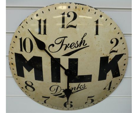 A caseless quartz dial wall clock with 'Fresh Milk Drinks at the Bar' advertising slogan to the distressed finish convex enam
