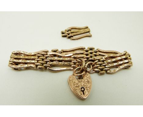 A 9ct gold gate bracelet with engraved foliate design, 11.8g 