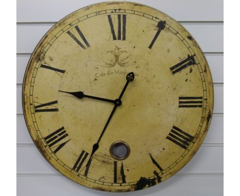An antiqued finish caseless wall clock, the Roman dial marked 'Cafe des Marguerites' with large faux key wind hole, 59cm diam