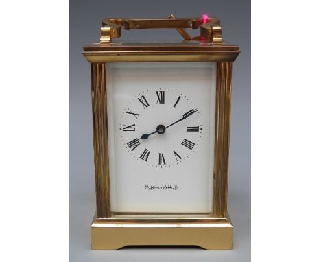 Mappin & Webb Ltd 20thC brass carriage clock with reeded square columns, 56mm white enamel Roman dial and blue steel spade ha