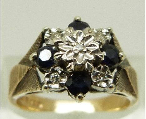 A 9ct gold ring set with diamonds and sapphires  in a cluster, size K, 4.0g 