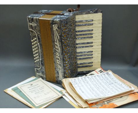 Estrella German made 24 bass piano accordion in blue pearloid finish with matching sharp keys in original case with some 1930