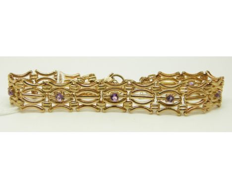 A 9ct gold gate bracelet set with amethysts with heart padlock clasp, in original box, 12.7g  