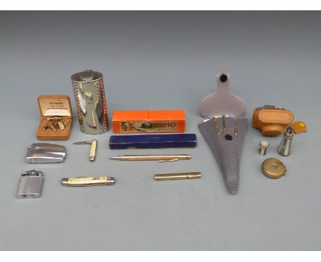 A quantity of collectables including Hohner Echo mouth organ, lighters, miniature camera, propelling pencil and cigarette lig