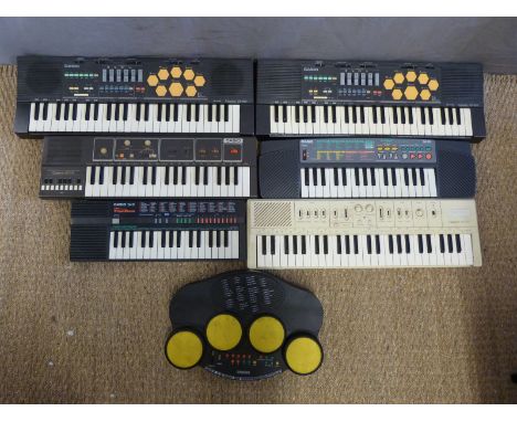 A collection of various Casio electronic keyboards to include Casiotone MT520, MT60 etc., and a Bontempi drum machine