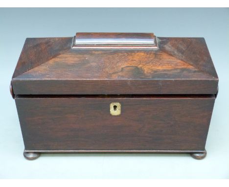 A 19thC rosewood tea two division tea caddy with hinged interior compartments and space for a mixing bowl, length 34cm, 20cm 