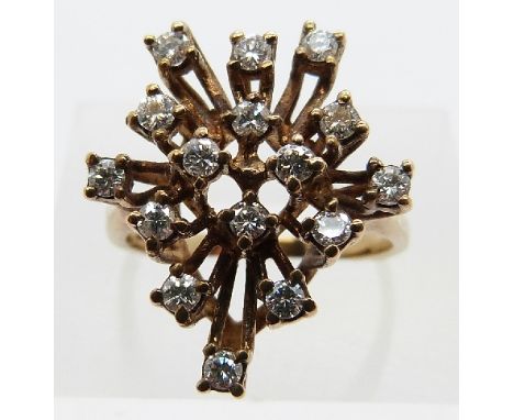 A 9ct gold ring set with diamonds in an abstract cluster, size M, 3.9g 