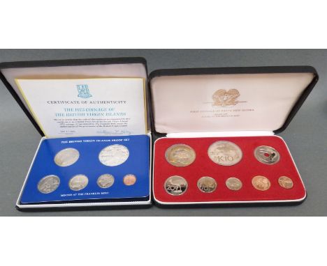 A cased First Coinage of Papua New Guinea coin set together with a British Virgin Isles proof set