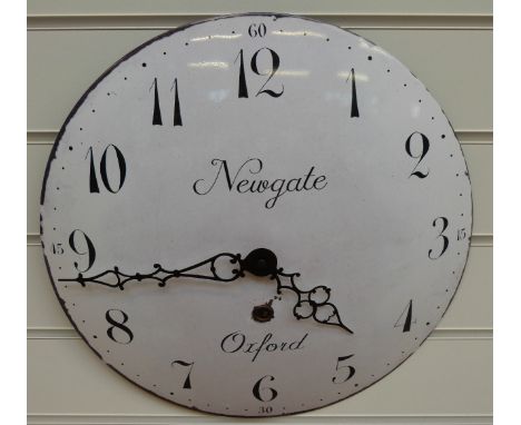 A caseless quartz dial wall clock with Arabic numerals and 'Newgate Oxford' to white enamelled convex dial, 40cm