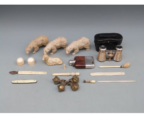 Four brass ball and claw feet, bone stanhope, Victorian ivory finials, carved polar bears, possibly Black Forest, spirit flas