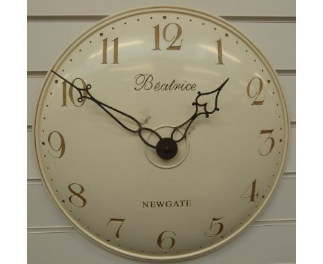 Newgate 'Beatrice' quartz caseless wall clock, the ivory coloured convex dial with contrasting gold coloured Arabic numerals,
