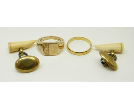 A 22ct gold wedding ring, 2.2g, 9ct gold signet ring, 5.4g and a pair of ivory cufflinks