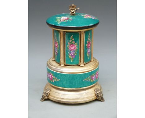 A Swiss musical box / automaton with revolving action and swivel out compartments, plays Edelweiss, 25cm tall